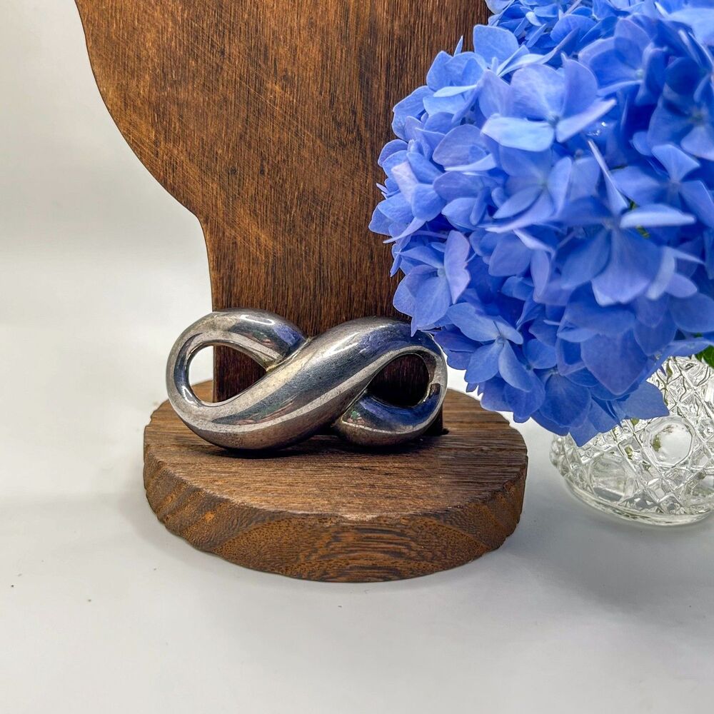 Givenchy Vintage Infinity Loop Brooch Silver Tone Ribbon Pin